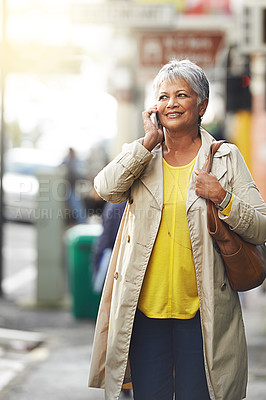Buy stock photo Senior woman, phone call and smile for walk and relax in city for free time or travel on sidewalk for fashion, retired and elderly. Happy person and pensioner with cell for talk, enjoy and trend 