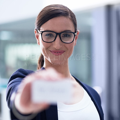 Buy stock photo Smile, woman and portrait with business card in office for information, contact or about us in workplace. Female agent, confident and hold up sign in agency for details, recruitment or get in touch