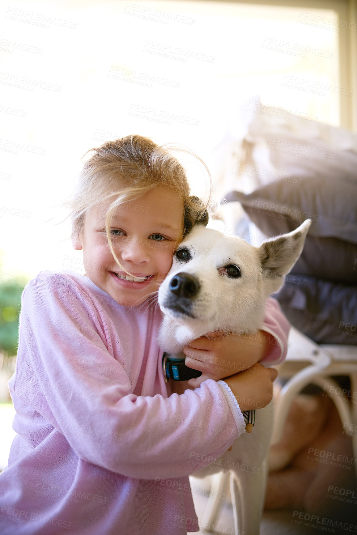 Buy stock photo Portrait, little girl and dog with hug in home for bonding, playing and happy together. Friends, child or puppy for companion, love or caring kid as pet owner for childhood development in house