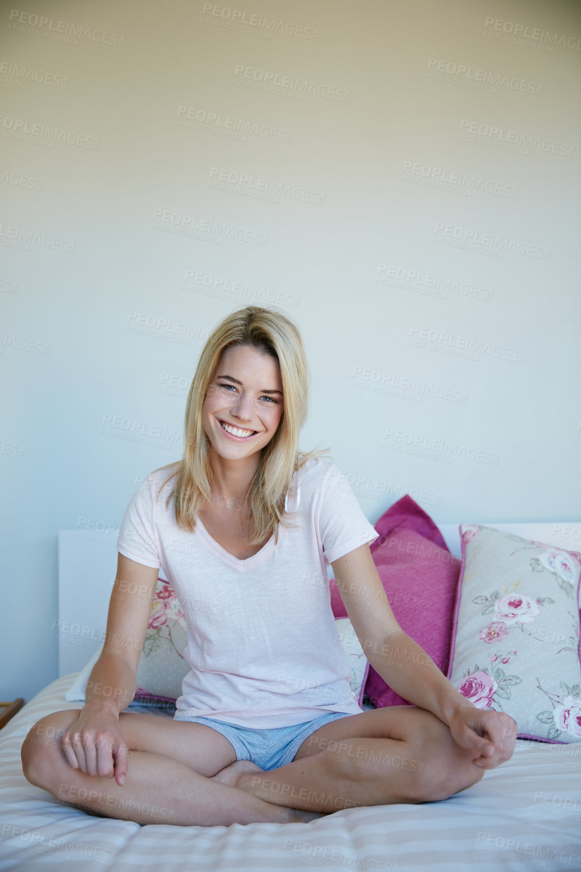 Buy stock photo Portrait shot of a young woman relaxing in her bedroom