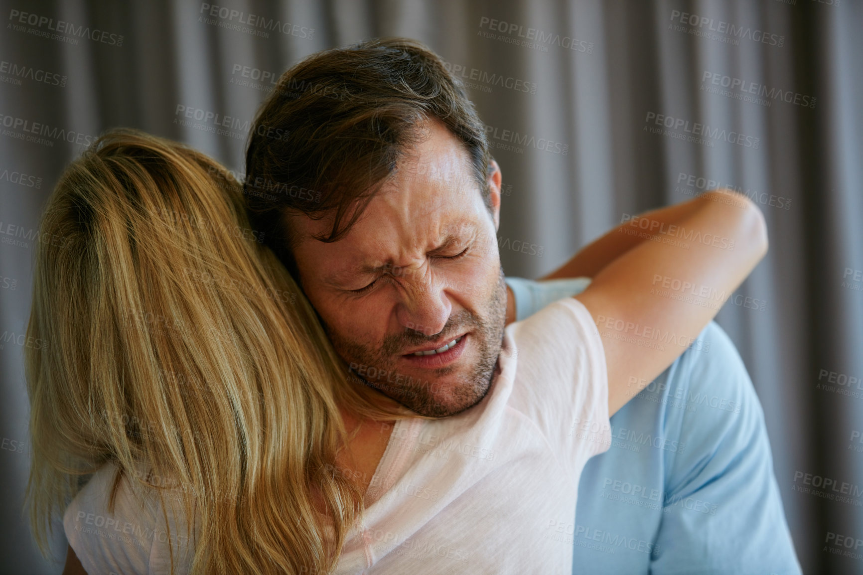 Buy stock photo Shot of a young couple supporting each other through difficulties