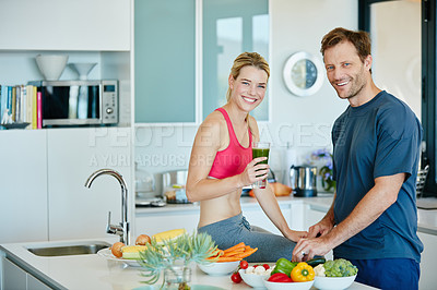 Buy stock photo Portrait of a couple preparing a nutritious meal together at home