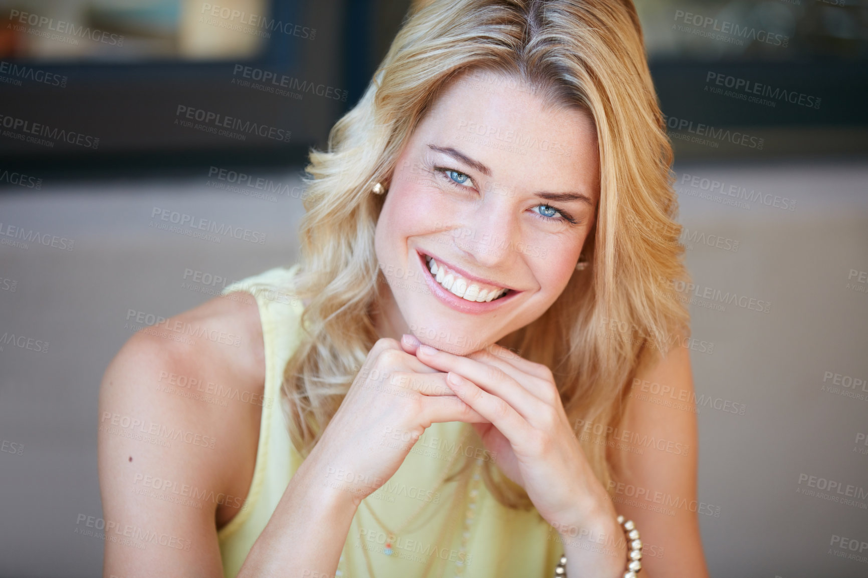 Buy stock photo Portrait of a happy young woman relaxing at home