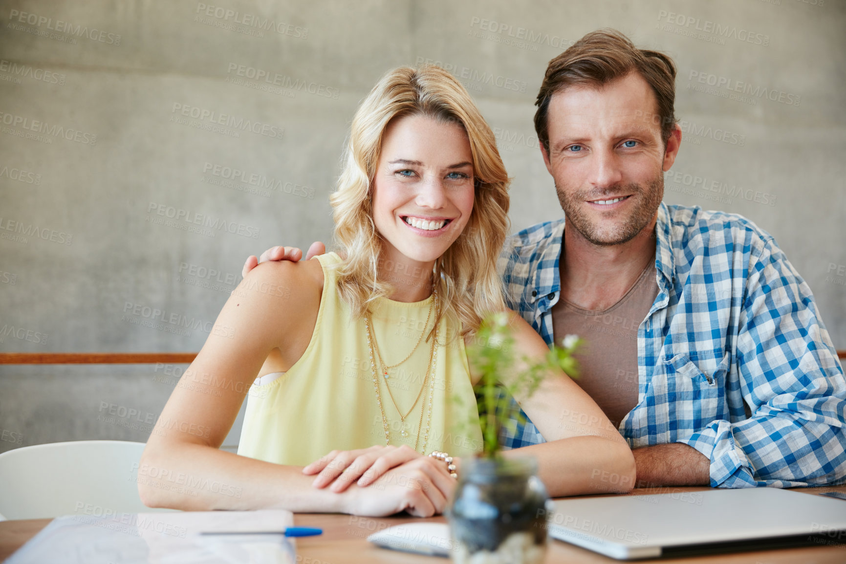 Buy stock photo Portrait of a happy couple doing their budgeting together at home