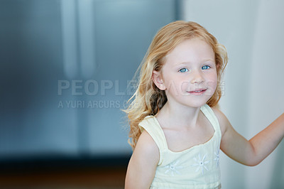 Buy stock photo Cropped portrait of a cute little girl standing in her home