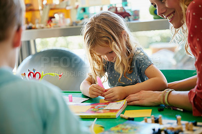 Buy stock photo Cropped shot of a little girl having fun with her family at home