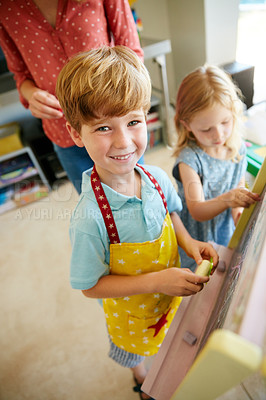 Buy stock photo Portrait of a little boy having fun with his family at home