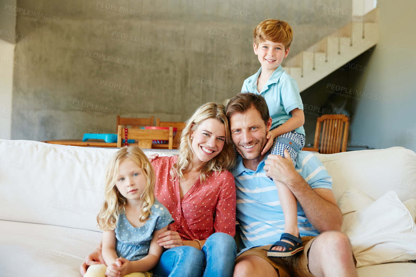 Buy stock photo Portrait of a happy family bonding together at home