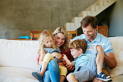 Buy stock photo Cropped shot of a happy family bonding together at home