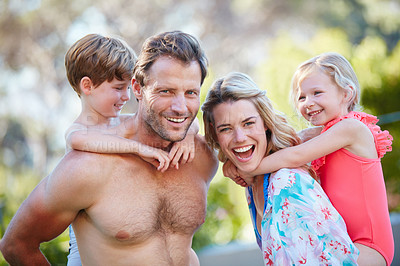 Buy stock photo Portrait of a happy family enjoying a day outdoors together