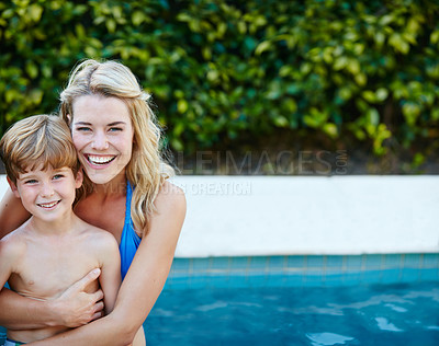 Buy stock photo Portrait of a mother and son swimming in a pool together
