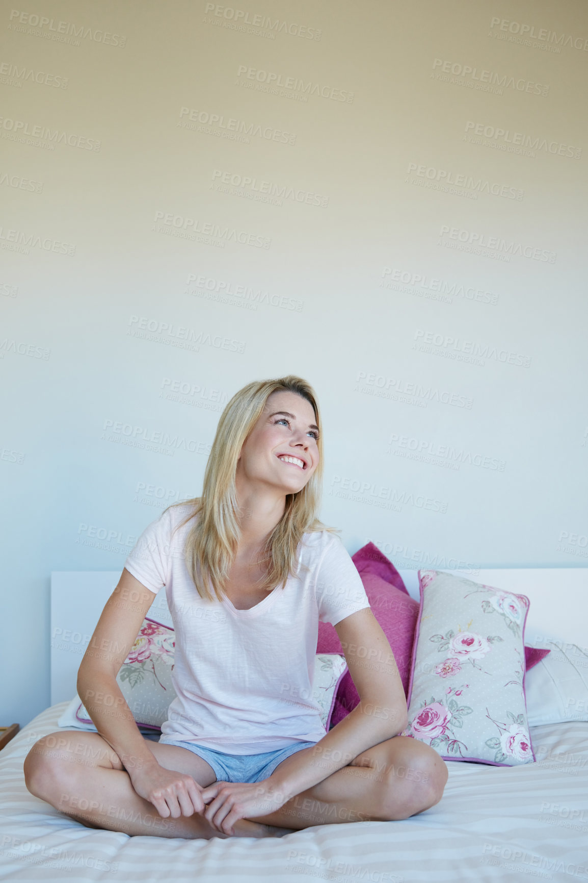 Buy stock photo Shot of a young woman relaxing at home