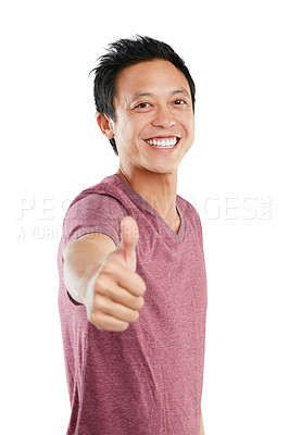 Buy stock photo Studio portrait of a young man standing and giving a thumbs up against a white background