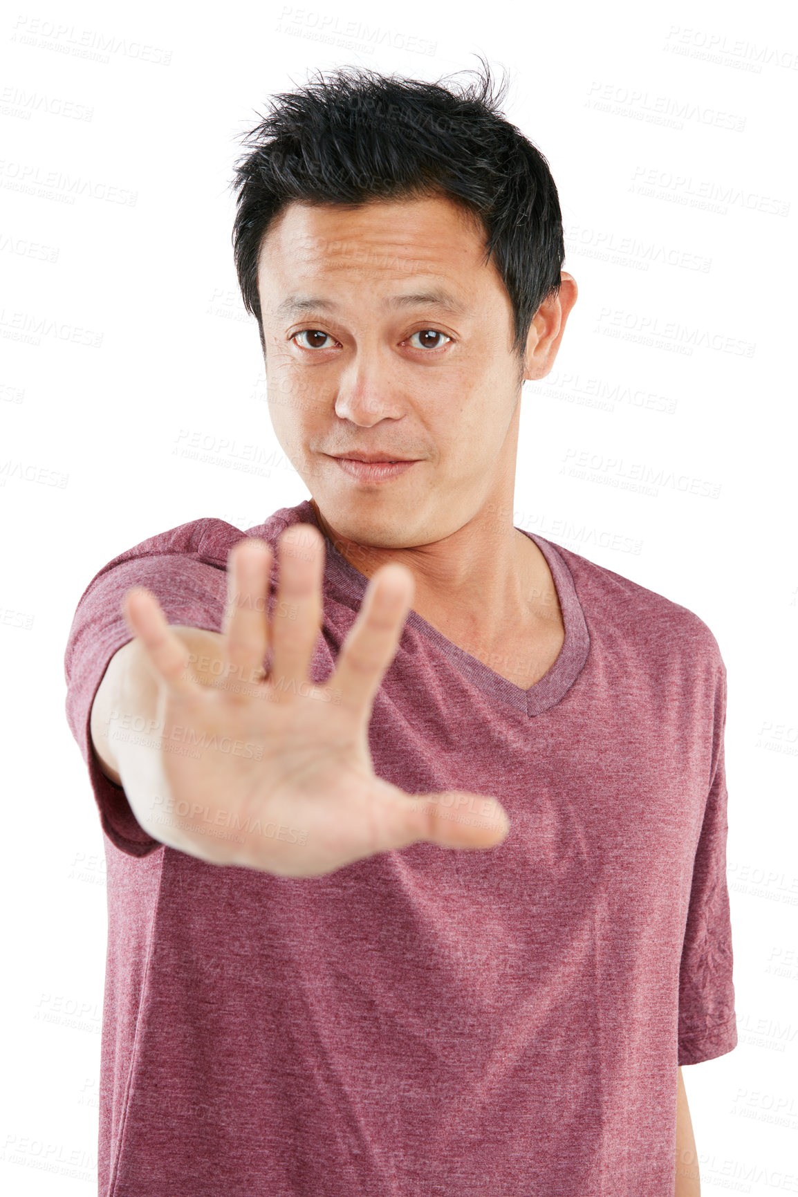 Buy stock photo Studio portrait of a young man holding out his hand against a white background