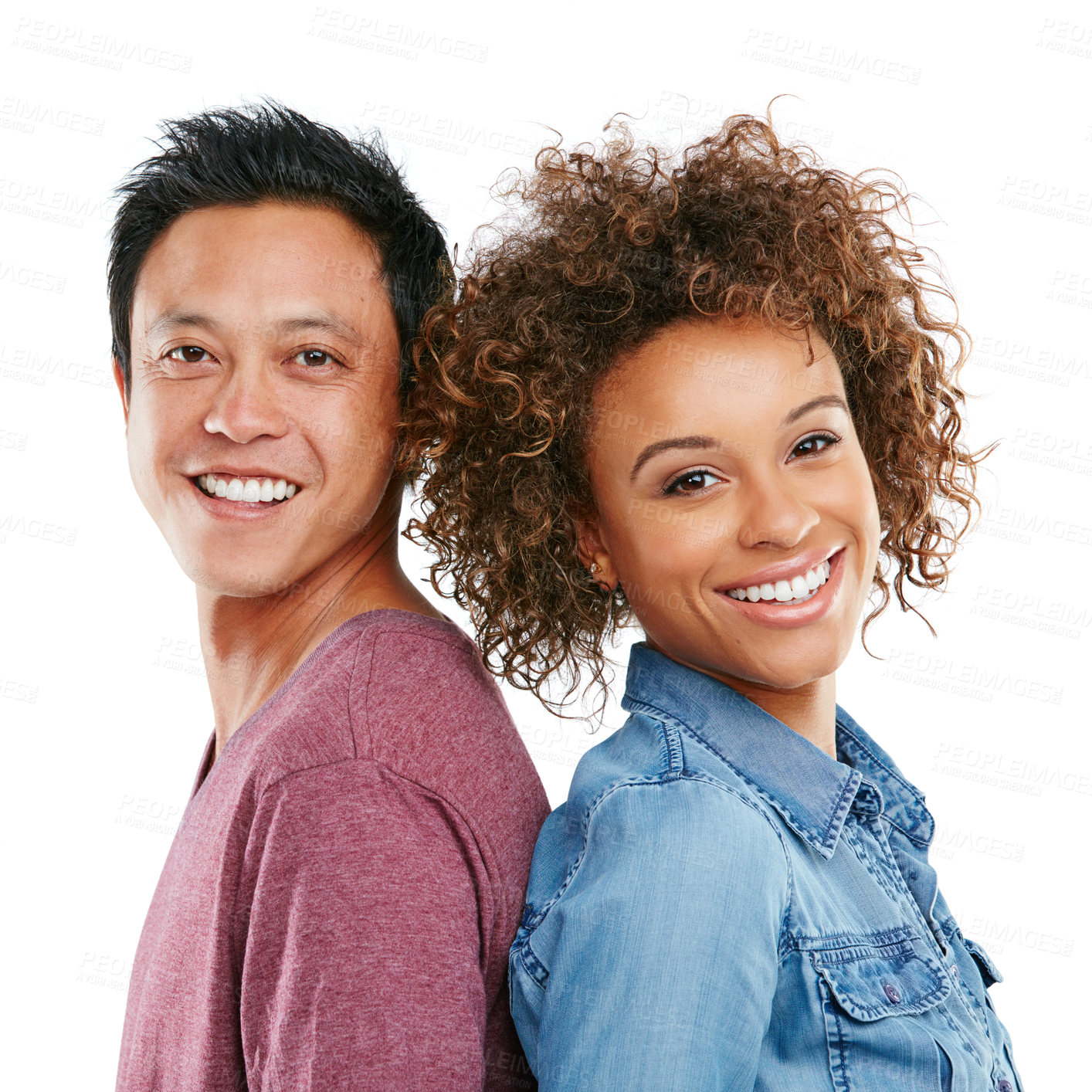 Buy stock photo Studio portrait of an affectionate young couple standing back to back against a white background