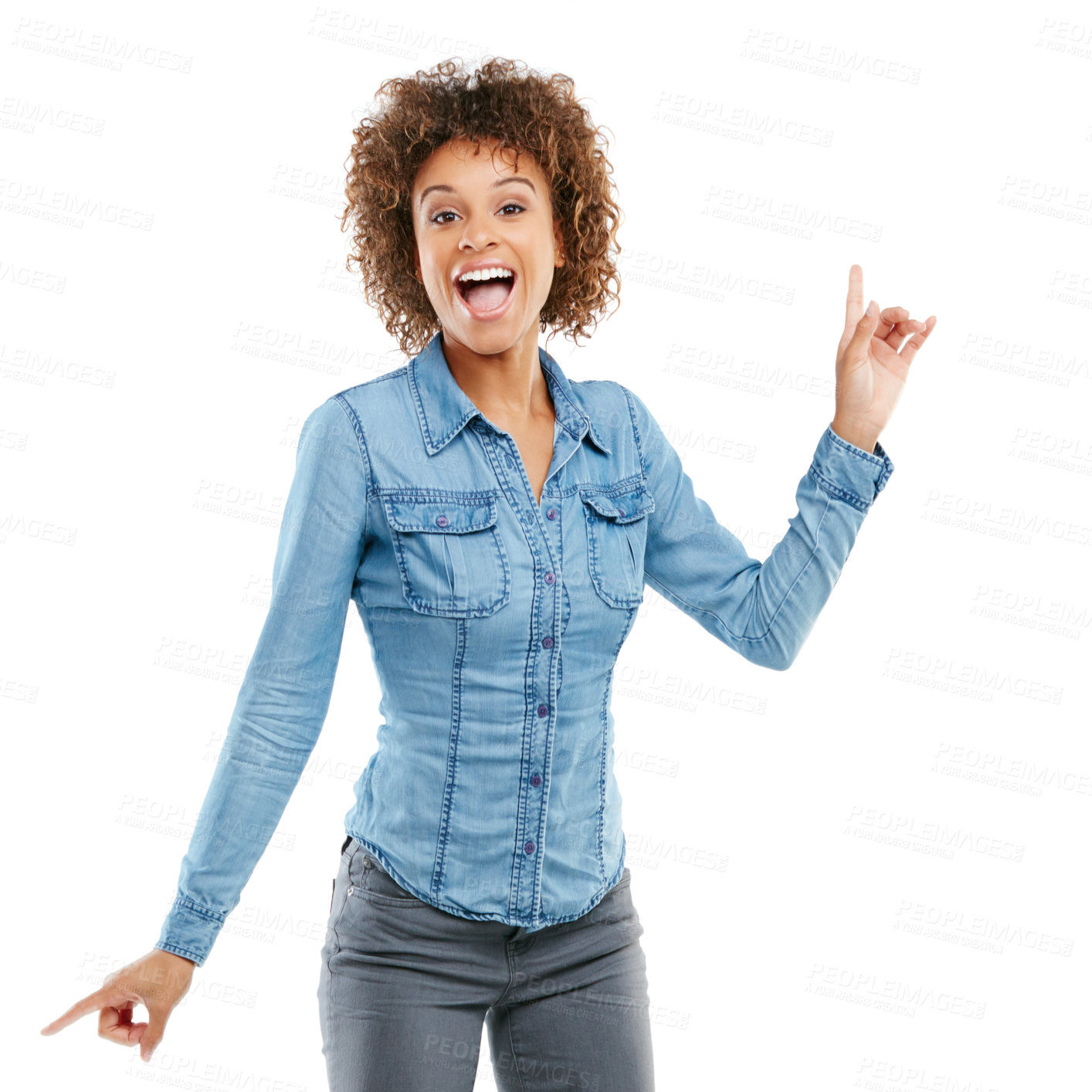 Buy stock photo Studio shot of an attractive young woman pointing in two different directions