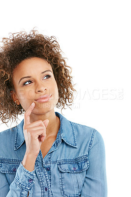 Buy stock photo Studio shot of an attractive young woman looking thoughtful against a white background