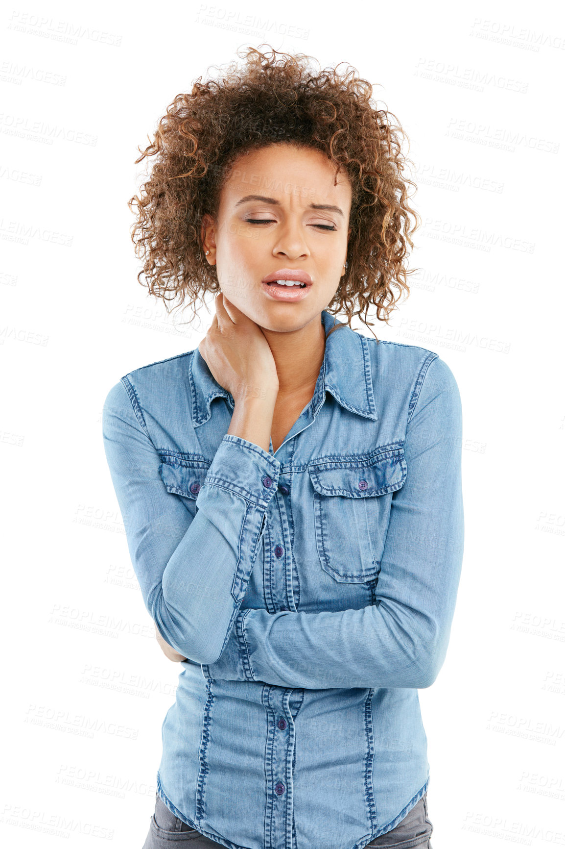 Buy stock photo Studio shot of a young woman experiencing neck pain against a white background