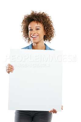 Buy stock photo Studio shot of an attractive young woman holding a placard