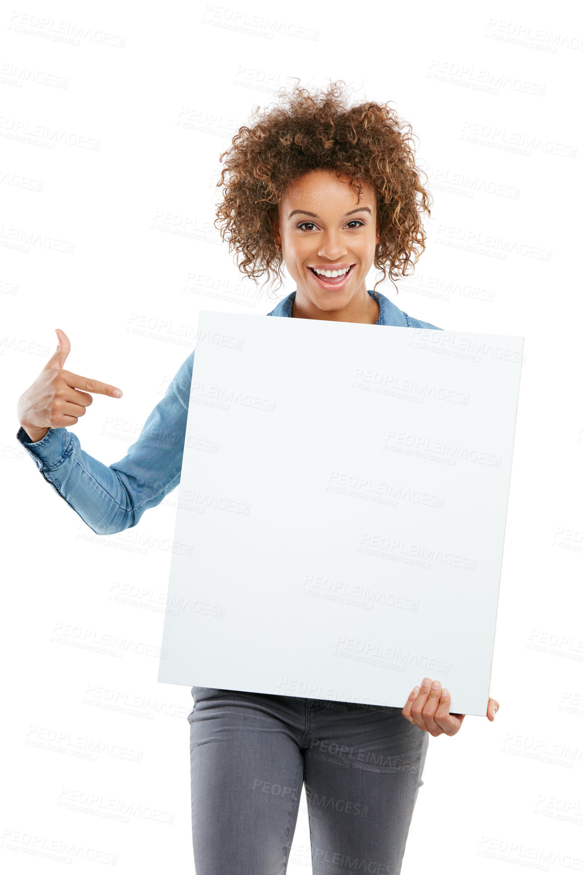 Buy stock photo Studio shot of an attractive young woman holding a placard