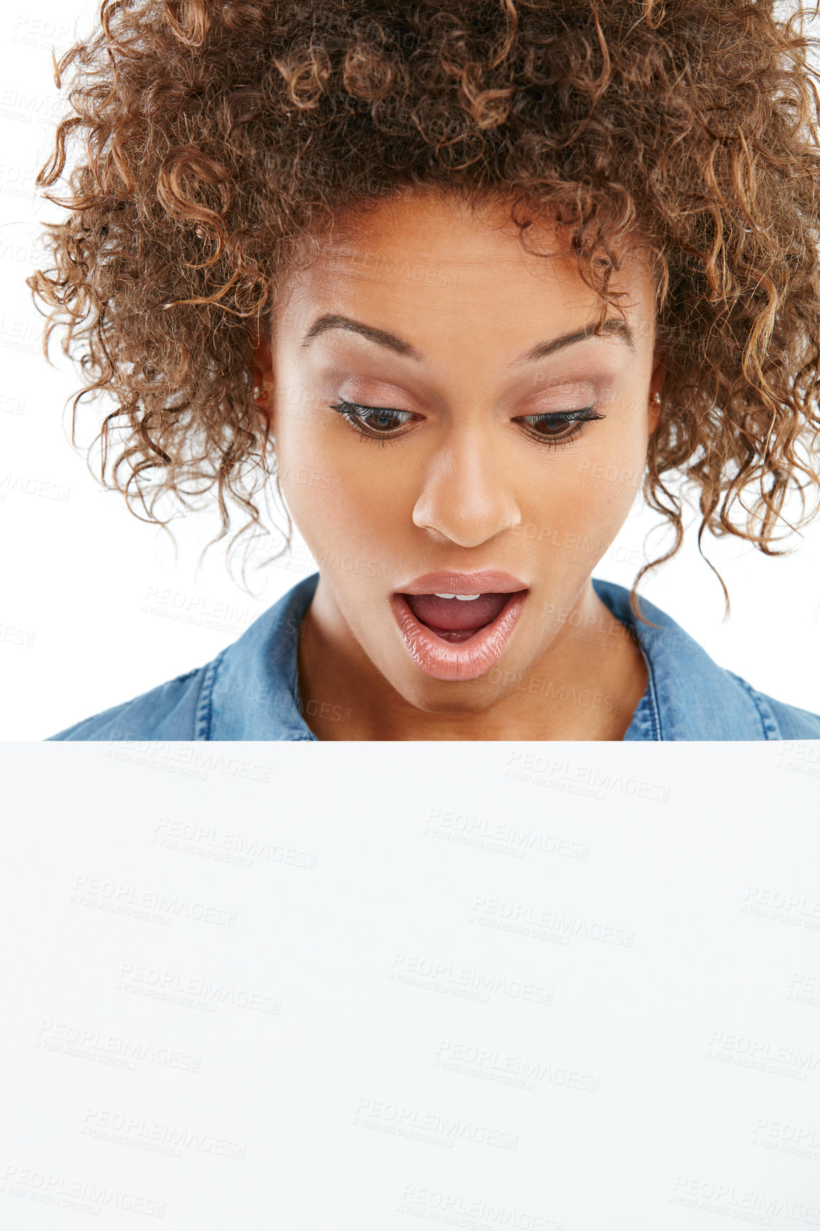 Buy stock photo Cropped shot of a young woman holding a placard