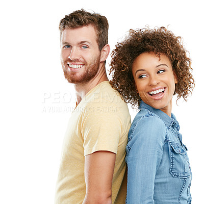 Buy stock photo Studio shot of an affectionate young couple standing back to back against a white background