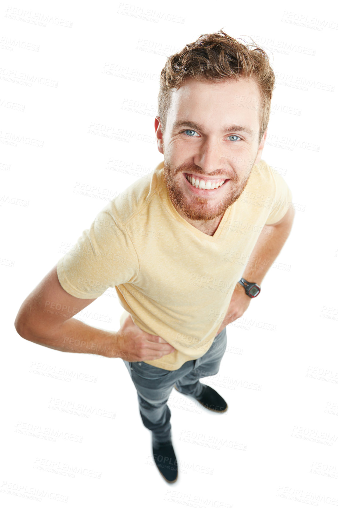 Buy stock photo Studio portrait of a young man looking up and smiling against a white background