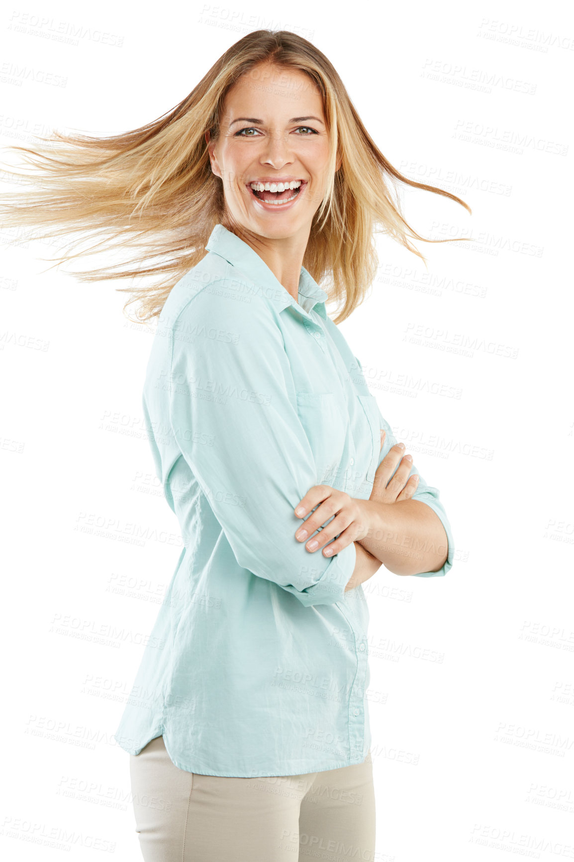 Buy stock photo Shot of a happy woman flipping her hair against a white background