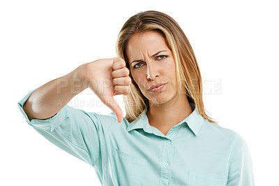 Buy stock photo Shot of an unhappy woman showing a thumbs down against a white background