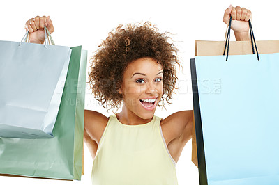 Buy stock photo Portrait, shopping and retail with a black woman in studio isolated on a white background while holding shopping bags. Store, customer and discount with a female model on black space for marketing