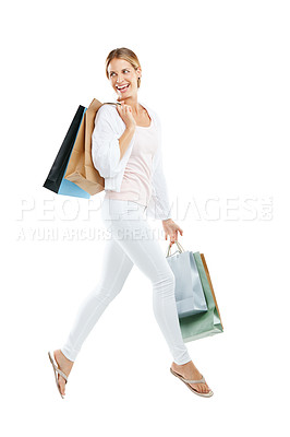 Buy stock photo Woman with smile, jump and happy with shopping bag, fashion and retail mockup, customer isolated on white background. Happiness, designer brand and clothes with discount sale, buying and freedom