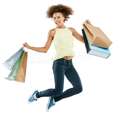 Buy stock photo Shopping, jump and woman with bags in studio after an amazing discount, sale or promotion. Energy, excited and portrait of female model from Brazil jumping after purchase isolated by white background