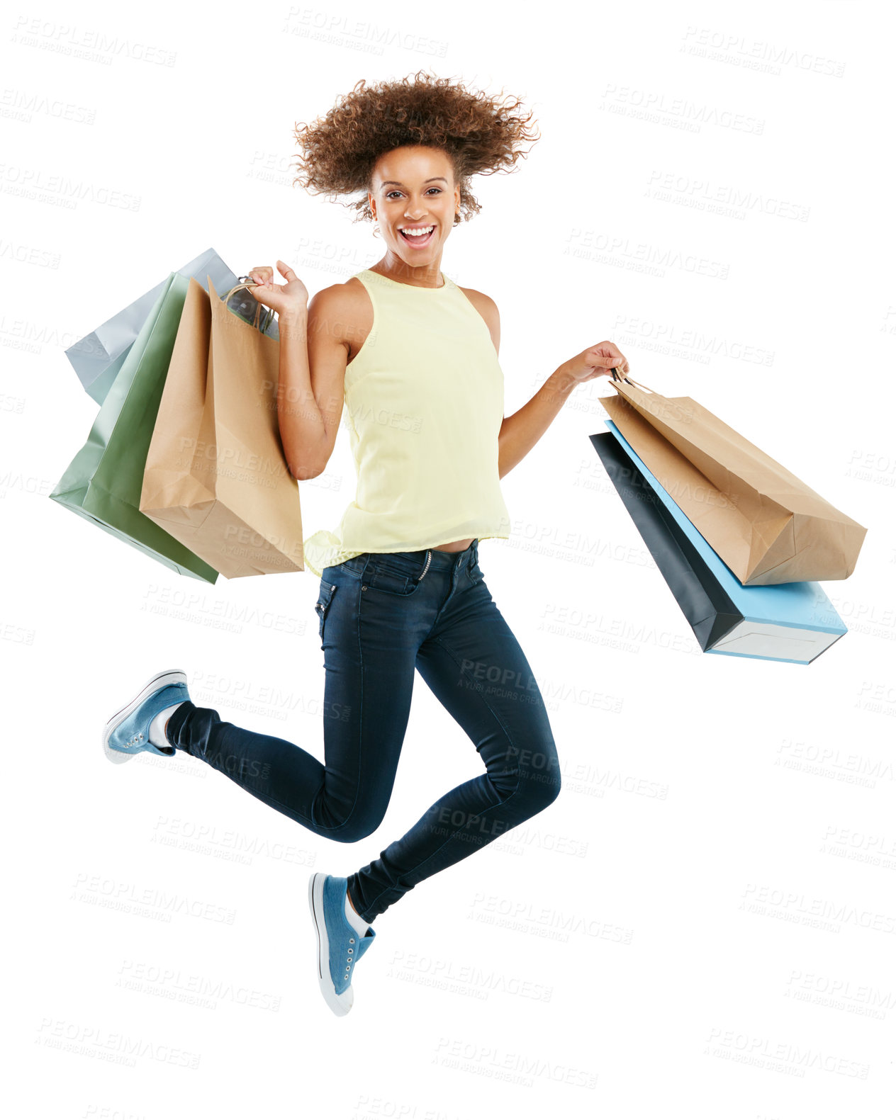 Buy stock photo Shopping bags, portrait and woman jumping in studio after an amazing discount, sale or promotion. Energy, excited and female model from Brazil with bags after a purchase isolated by white background.