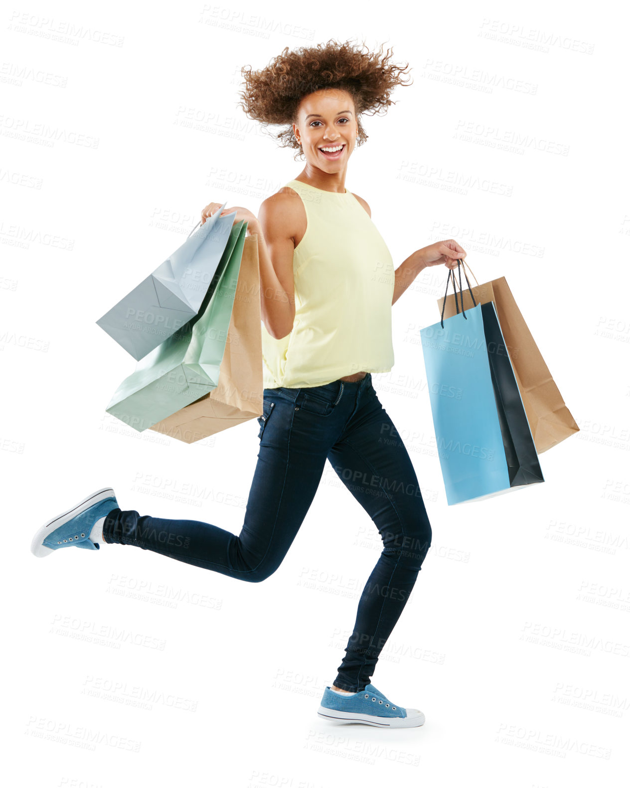 Buy stock photo Shopping bag, running and black woman in studio portrait for retail sale, advertising or marketing fashion product. Shopping, fast and discount date with excited customer isolated on white background