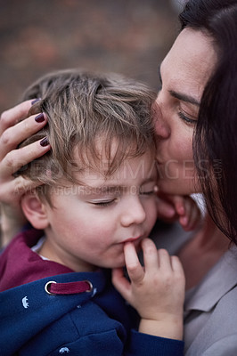 Buy stock photo Cropped shot of a mother embracing her little son