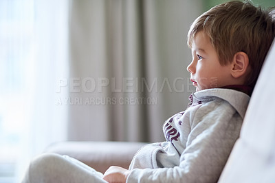 Buy stock photo Cropped shot of a little boy relaxing at home