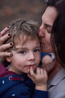 Buy stock photo Cropped shot of a mother embracing her little son