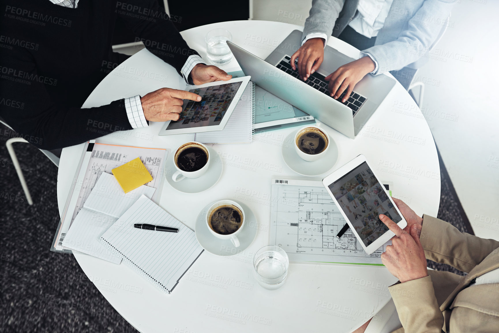 Buy stock photo Teamwork, tablet and hands with coffee in workplace for morning, meeting and startup company. Diversity, business and collaboration and technology for research, planning and idea with paperwork 