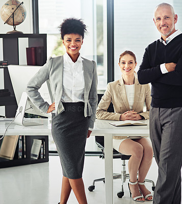 Buy stock photo Portrait of a group of smiling businesspeople in a modern office