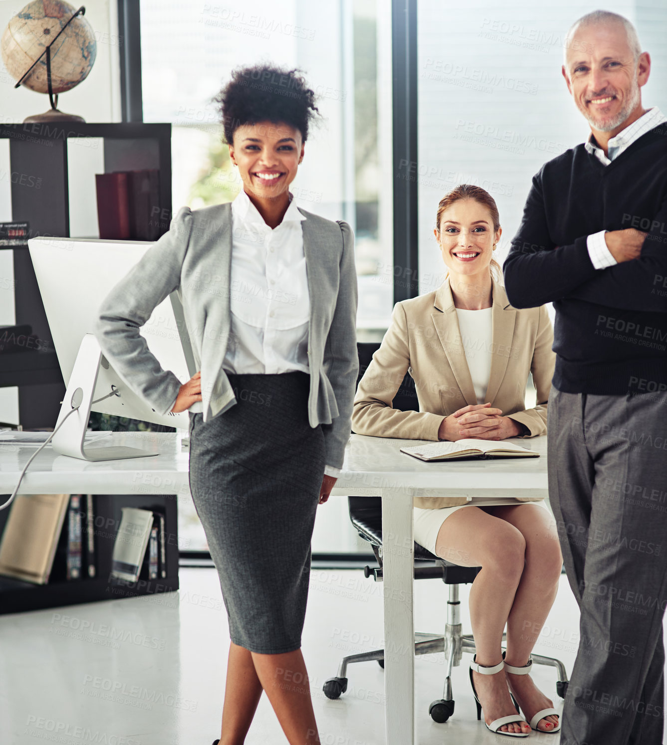 Buy stock photo Portrait of a group of smiling businesspeople in a modern office