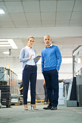 Buy stock photo Portrait, man and woman with tablet in factory for production monitoring, inventory or order management and inspection. Team, digital tech and warehouse for printing material and manufacturing.