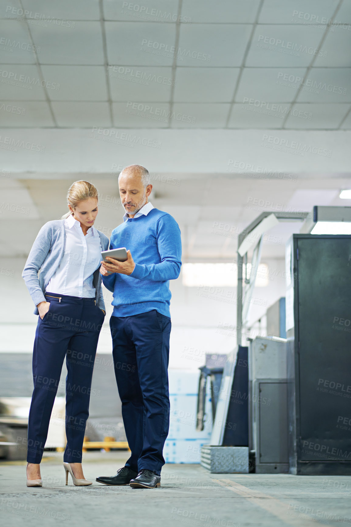 Buy stock photo Mature, man and person with tablet in factory for production monitoring, inventory or order management and inspection. Team, digital tech and warehouse for printing material and distribution industry