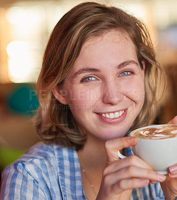 Buy stock photo Happy, young woman and coffee at home for portrait in living room with caffeine for energy to relax on break. Smile, student and calm or peace with cocoa on sofa for self care at house in Germany