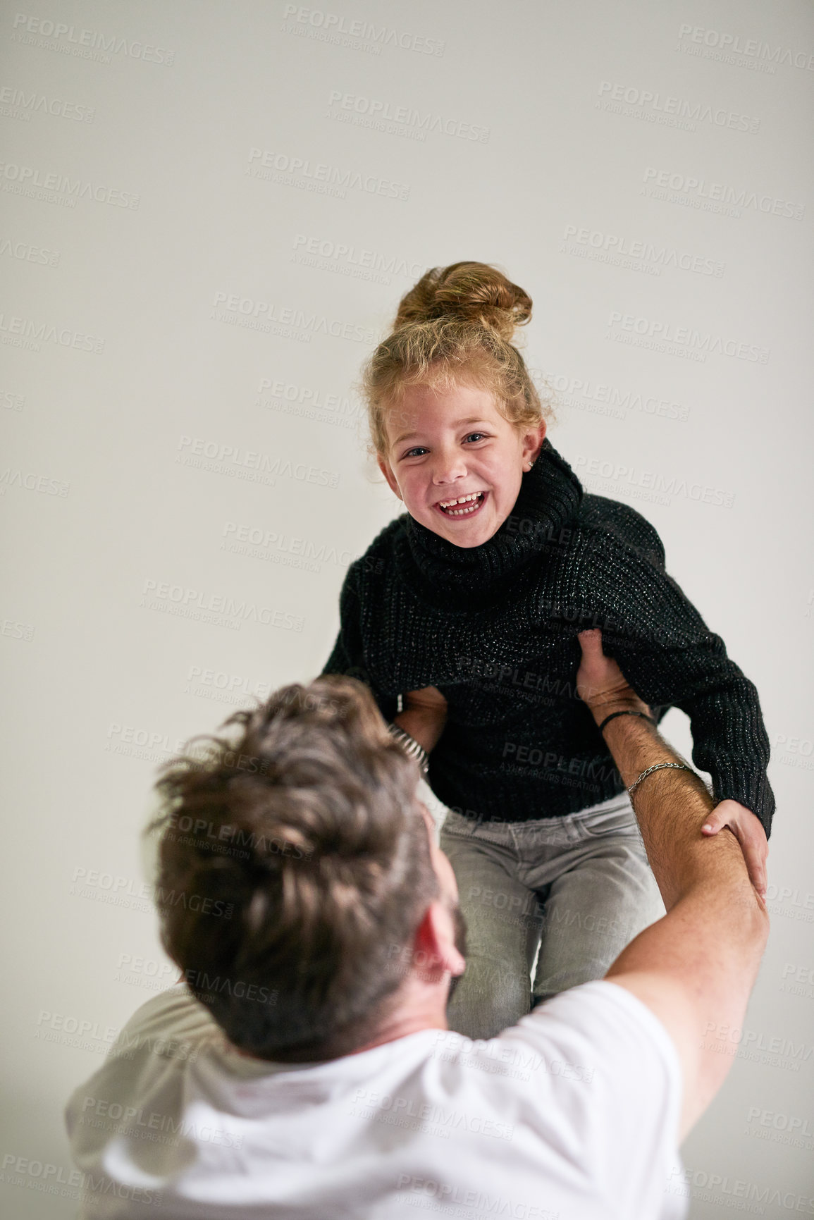 Buy stock photo Excited, lift and portrait of girl with dad for support, love and bonding together on fathers day. Man, kid and happy with smile at home for playful fun, trust and safety in child development