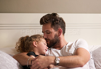 Buy stock photo Home, love and father with girl, comfort and bonding together with family, relax and connect. Bedroom, single parent and dad with daughter, childhood and kid with peace, calm and sleeping with kiss