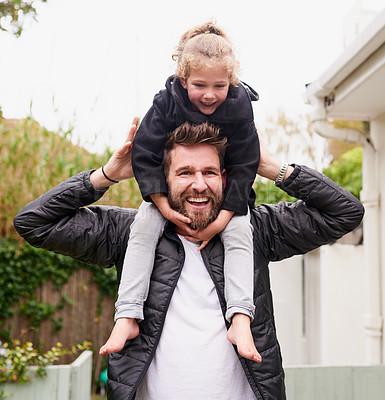 Buy stock photo Portrait of father carrying his little daughter on his shoulders