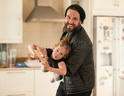 Buy stock photo Portrait of a father and daughter bonding together at home