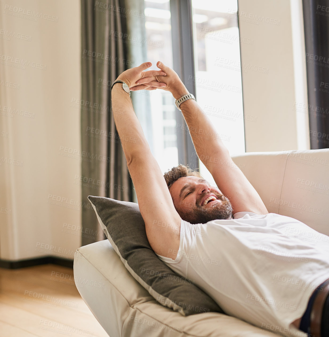 Buy stock photo Relax, stretching and man in home, couch and chill on break, weekend and time for holiday with peace. Apartment, rest and sleeping of person in house, smile and happiness in morning, lounge and lazy