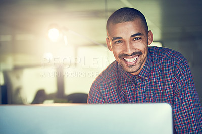 Buy stock photo Portrait of a young designer working late in an office