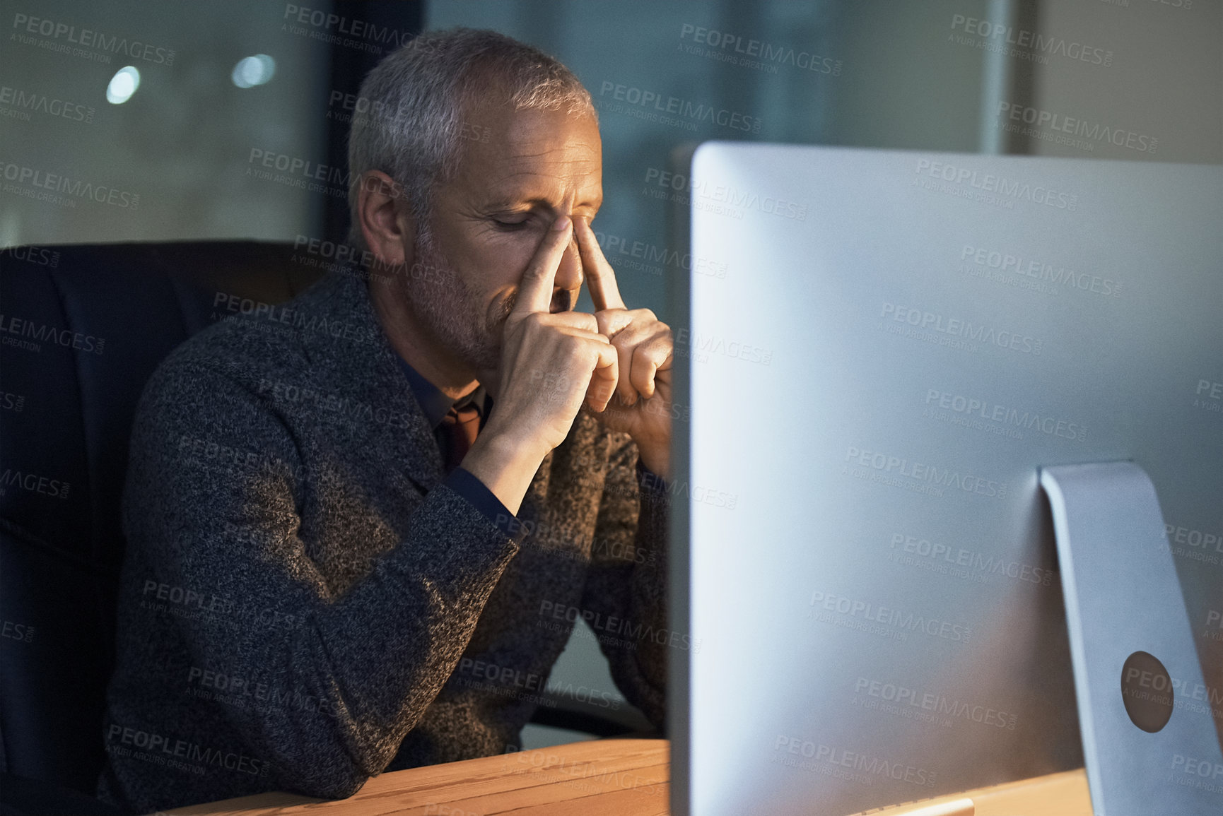 Buy stock photo Night, office and stress headache by senior man on computer with problem crisis or internet glitch. Migraine, burnout and frustrated elderly male person working late on deadline, 404 or business fail